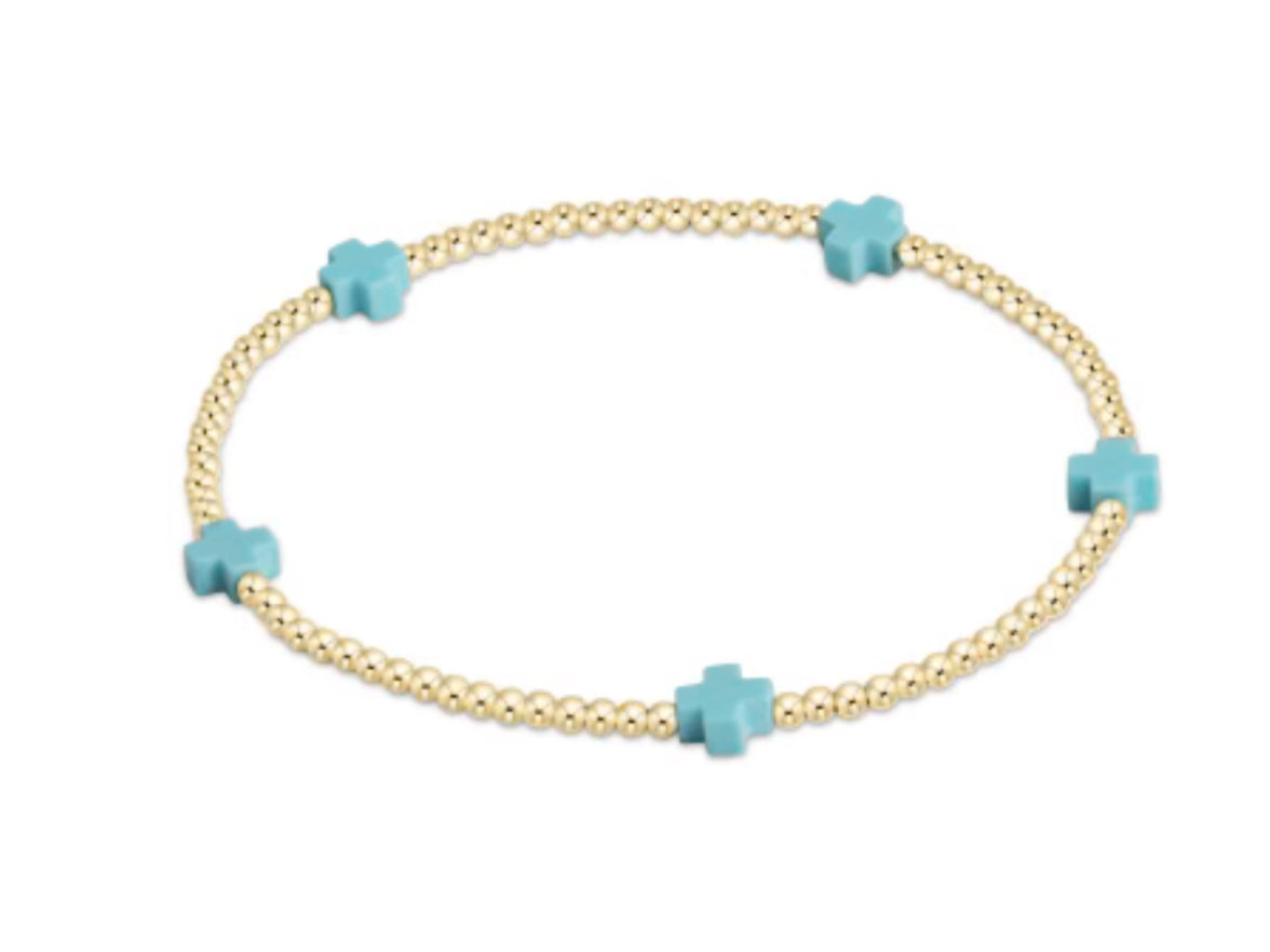 E NEWTON E GIRL SIGNATURE CROSS SMALL GOLD PATTERN 2MM BEAD BRACELET