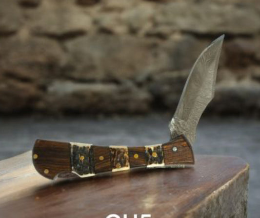 CIRCLE SH CUTLERY 3 1/2” CLOSED DAMASCUS FOLDER STAG AND WOOD HANDLE KNIFE