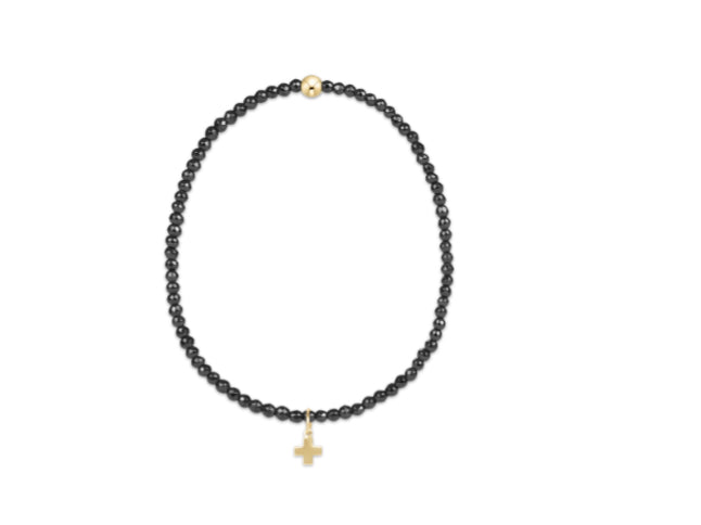 E NEWTON EXTENDS FACETED HEMATITE 2MM BEAD BRACELET - SIGNATURE CROSS GOLD CHARM