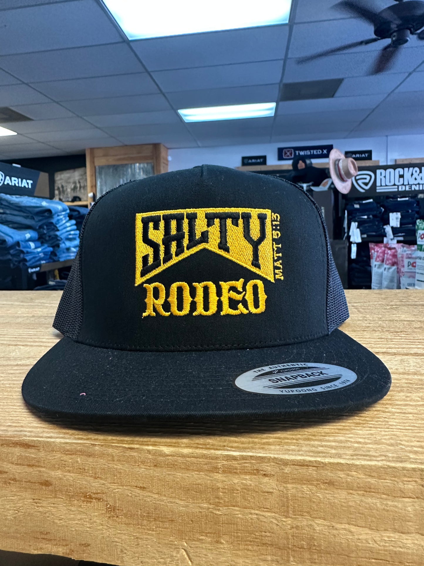 SALTY RODEO BLACK GOLD TRUCKER HAT