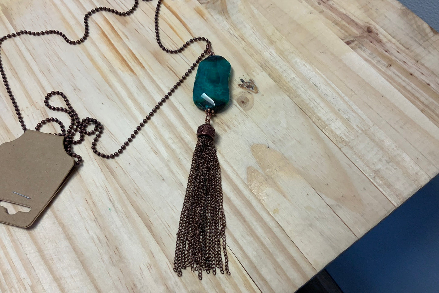 TURQUOISE HAVEN COPPER CHAIN WITH LARGE EMERALD STONE AND COPPER TASSEL