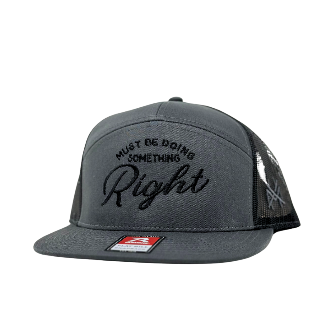 The Mad Hatter Co - MHC Must Be Doing Something Right Trucker Hat: Black/Natural Otto