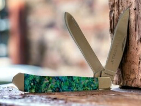 TWISTED X 4 1/4” SS COUBLE BLADE KNIFE ABALONE HANDLE