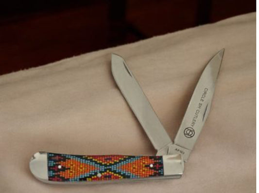 CIRCLE SH CUTLERY KNIFE ORANGE/BLUE BEADED PATTERN FOLDING
