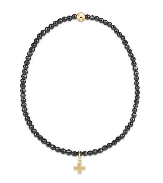 E NEWTON FACETED HEMATITE 2MM BEAD BRACELET -SIGNATURE GOLD CROSS