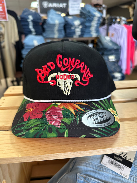 BAD COMPANY BLACK 5 PANL TRUCKER WITH FLORAL PATTERN BILL WITH RED /YELLOW EMBROIDERY LOGO