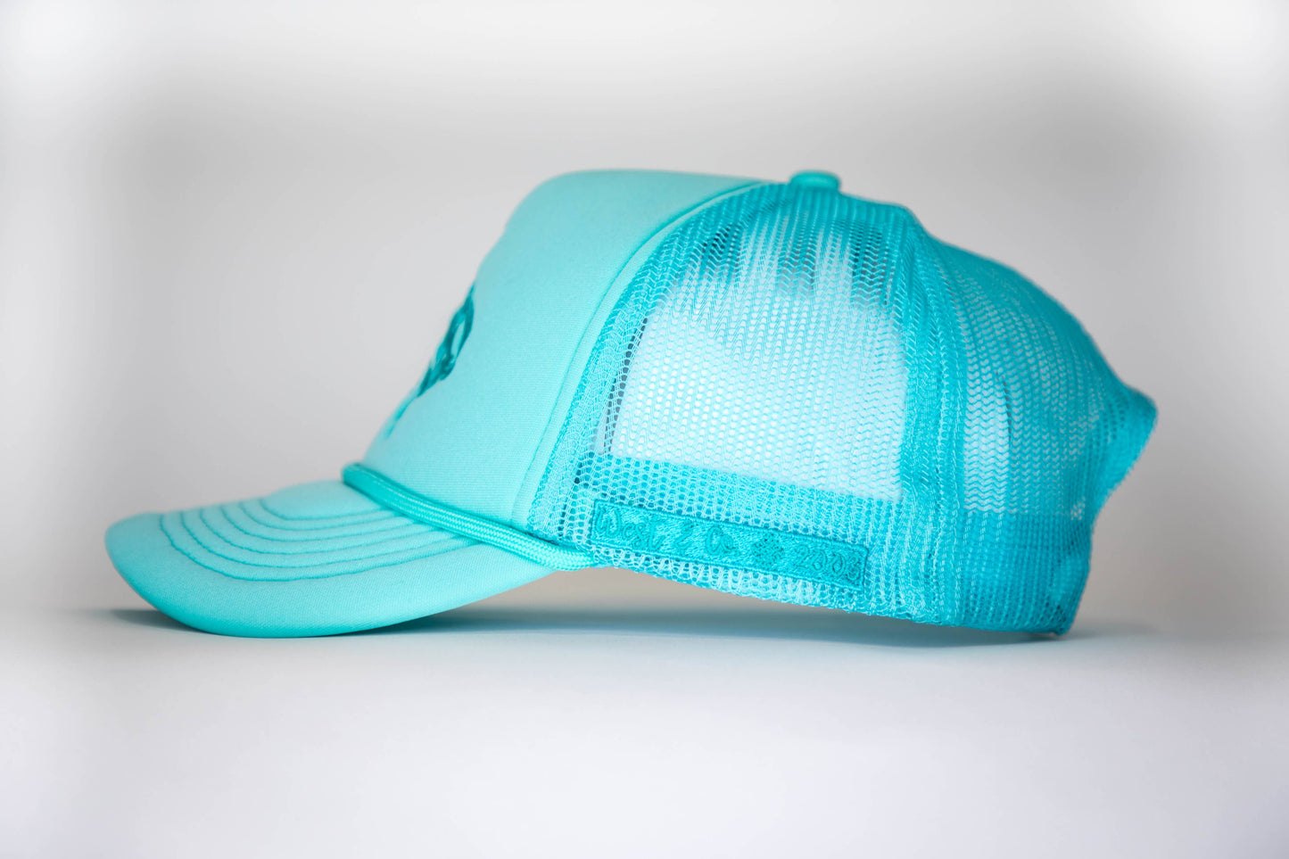 West & Co. - Turq Trucker Cap w/Turq Embroidered Bucking Horse Design