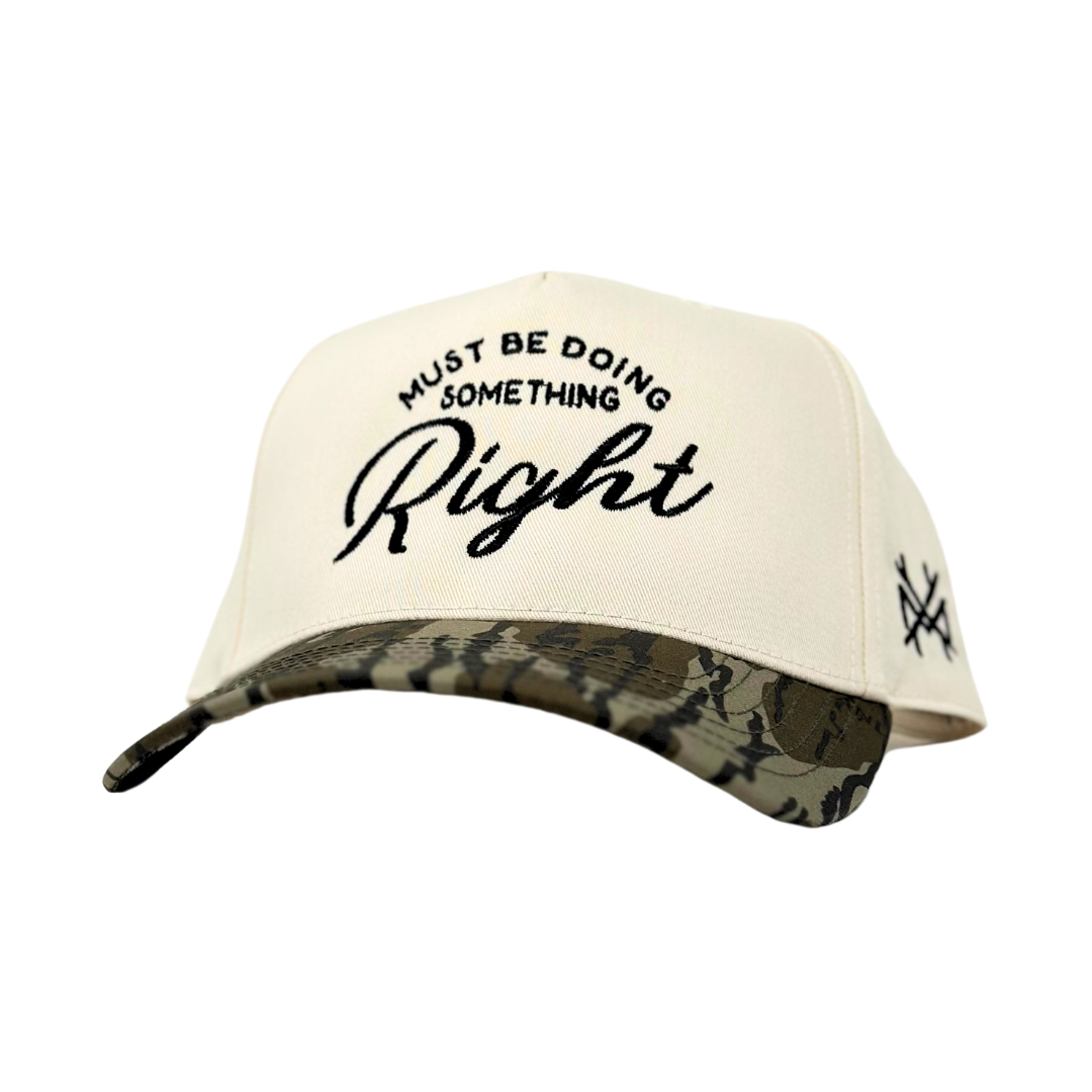 The Mad Hatter Co - MHC Must Be Doing Something Right Trucker Hat: Black/Natural Otto